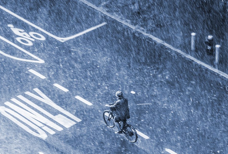 People on the street during a summer hail storm